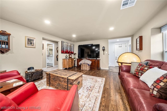 living room featuring dark hardwood / wood-style floors