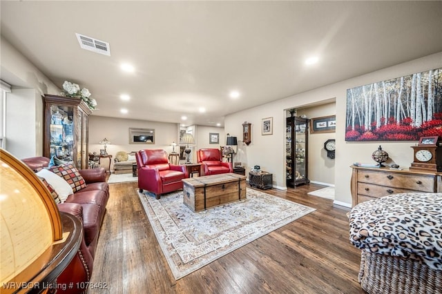 living room featuring dark hardwood / wood-style floors