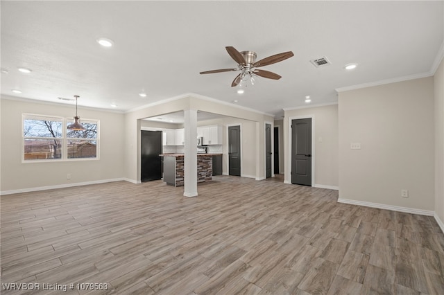 unfurnished living room with a ceiling fan, visible vents, baseboards, recessed lighting, and light wood-type flooring