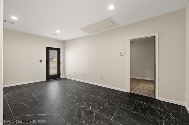 spare room with recessed lighting, visible vents, marble finish floor, and baseboards