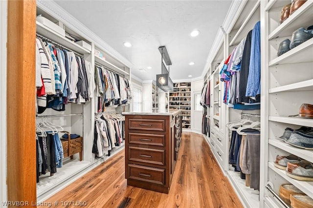 walk in closet featuring light wood-type flooring