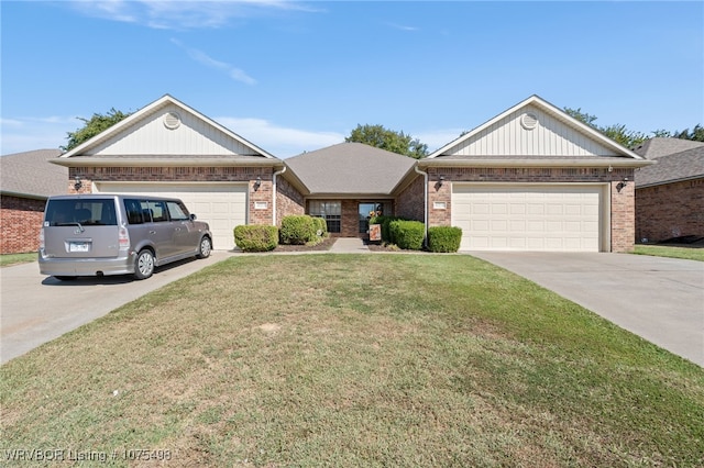 single story home featuring a front yard and a garage