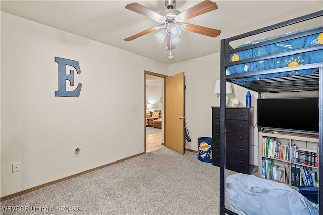 carpeted bedroom featuring ceiling fan