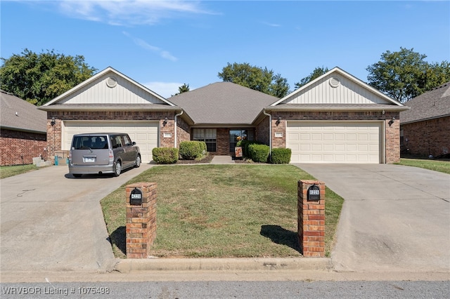 ranch-style home with a front yard and a garage