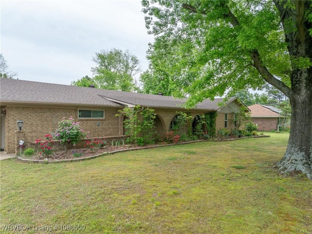 8611 Royal Ridge Dr, Fort Smith, AR 72903 - view of front of home with a front yard and brick siding
