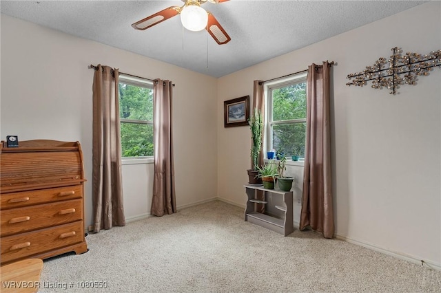 8611 Royal Ridge Dr, Fort Smith, AR 72903 - unfurnished room featuring a ceiling fan, healthy amount of natural light, carpet floors, and a textured ceiling