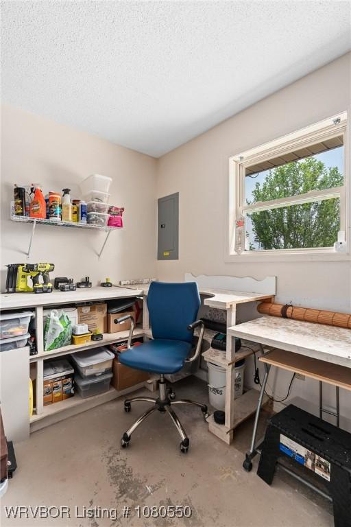 8611 Royal Ridge Dr, Fort Smith, AR 72903 - office area featuring electric panel, unfinished concrete floors, and a textured ceiling