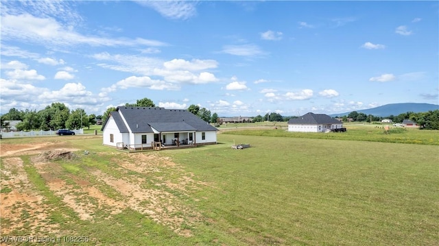 16312 Castle Rd, Poteau, OK 74953 - rear view of house featuring a yard, a mountain view, and a view of countryside