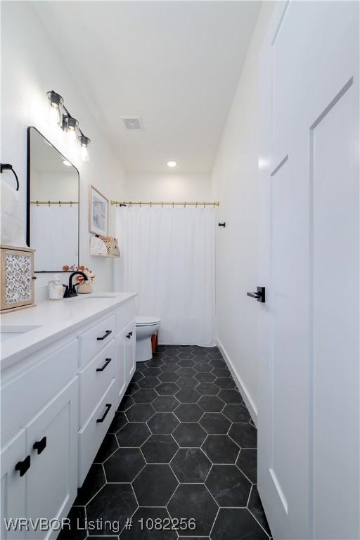 16312 Castle Rd, Poteau, OK 74953 - full bath with vanity, recessed lighting, and a shower with curtain
