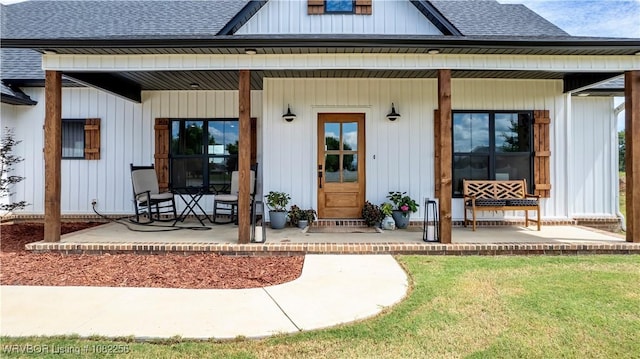 16312 Castle Rd, Poteau, OK 74953 - doorway to property with a shingled roof and a porch