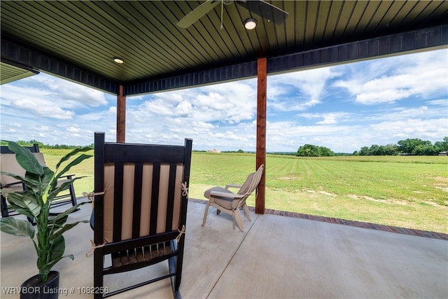 16312 Castle Rd, Poteau, OK 74953 - view of patio / terrace with a view of countryside and ceiling fan