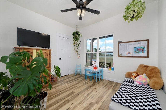 16312 Castle Rd, Poteau, OK 74953 - game room featuring light wood finished floors and a ceiling fan