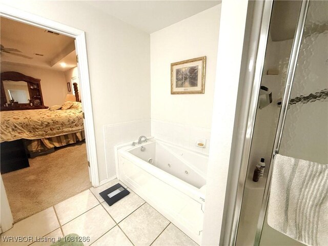 2103 W George, Pocola, OK 74902 - bathroom with connected bathroom, a whirlpool tub, a stall shower, and tile patterned floors