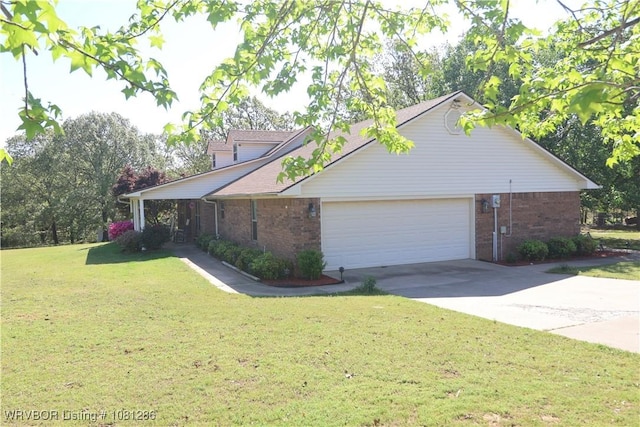 2103 W George, Pocola, OK 74902 - view of property exterior featuring brick siding, a garage, a lawn, and driveway