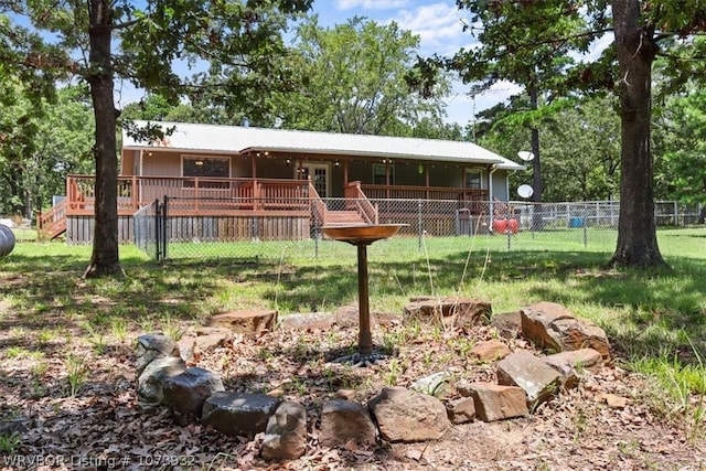 exterior space with a deck and a yard