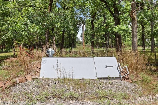 view of entry to storm shelter