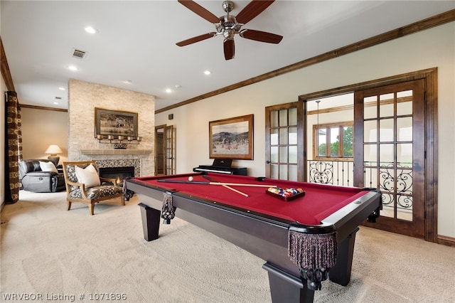 rec room featuring light colored carpet, ornamental molding, billiards, and french doors