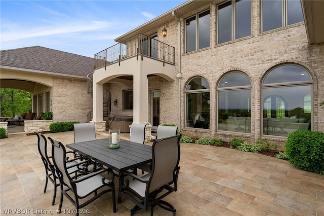 view of patio / terrace with a balcony