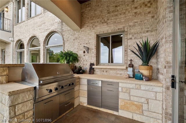 view of patio featuring area for grilling and grilling area