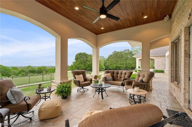 view of patio featuring ceiling fan and an outdoor hangout area