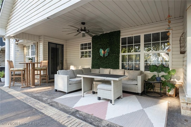 view of patio / terrace with an outdoor living space and ceiling fan