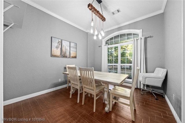 dining area with a notable chandelier and crown molding