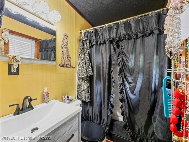 3204 W George, Pocola, OK 74902 - bathroom featuring vanity and tile walls