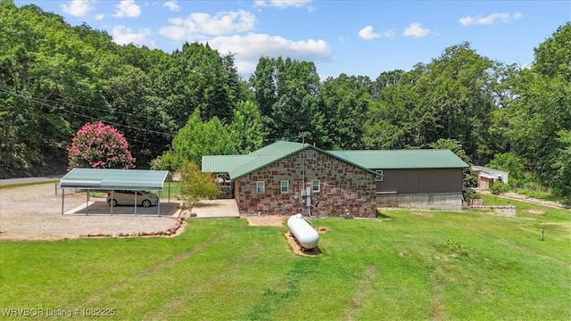 3204 W George, Pocola, OK 74902 - view of home's exterior with a carport, a yard, and dirt driveway