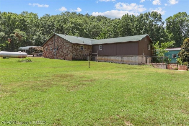 3204 W George, Pocola, OK 74902 - view of green lawn with a carport