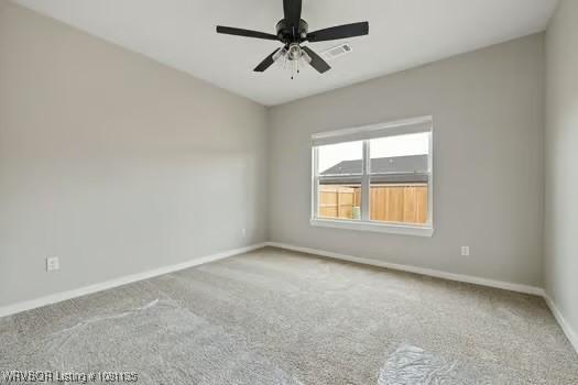 2018 Yellowstone Dr, Barling, AR 72903 - unfurnished room featuring baseboards, carpet floors, and ceiling fan