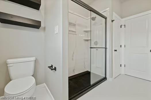 2018 Yellowstone Dr, Barling, AR 72903 - bathroom with a shower stall and toilet