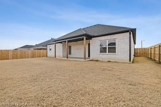 2018 Yellowstone Dr, Barling, AR 72903 - back of house featuring a fenced backyard