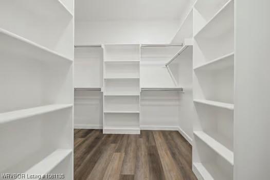 2018 Yellowstone Dr, Barling, AR 72903 - spacious closet with dark wood-style flooring