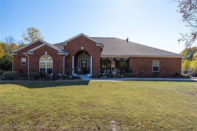 single story home with a front yard