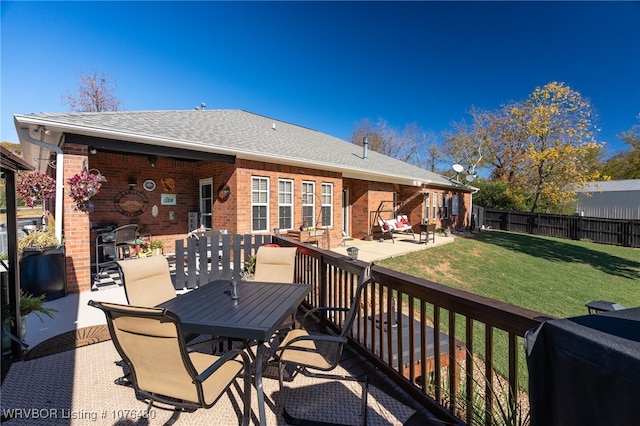 exterior space featuring a lawn and a patio