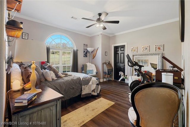 bedroom with dark hardwood / wood-style flooring, ceiling fan, and ornamental molding