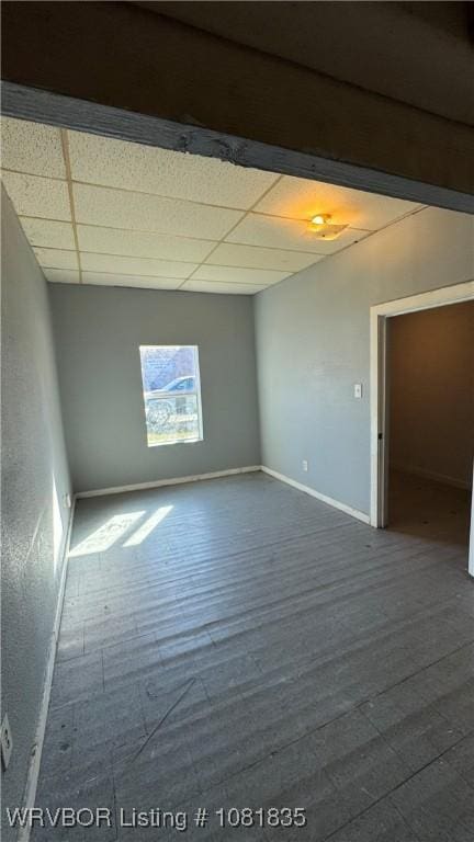 515 N 12th St Unit A & B, Fort Smith, AR 72901 - empty room with a drop ceiling and baseboards