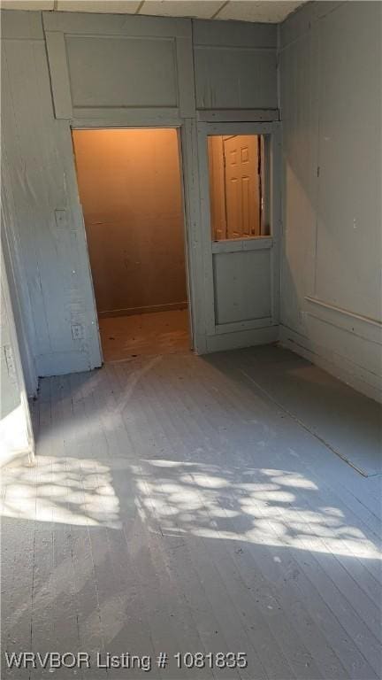 515 N 12th St Unit A & B, Fort Smith, AR 72901 - spare room featuring hardwood / wood-style floors