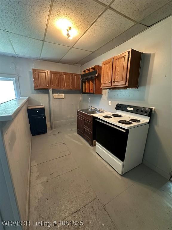 515 N 12th St Unit A & B, Fort Smith, AR 72901 - kitchen featuring white electric stove, a paneled ceiling, and brown cabinets