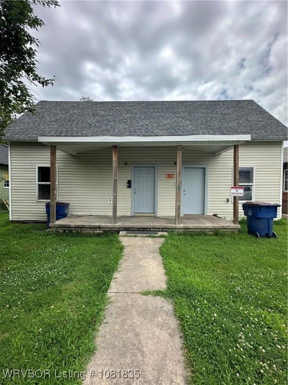 515 N 12th St Unit A & B, Fort Smith, AR 72901 - bungalow-style home featuring covered porch, a front lawn, and roof with shingles