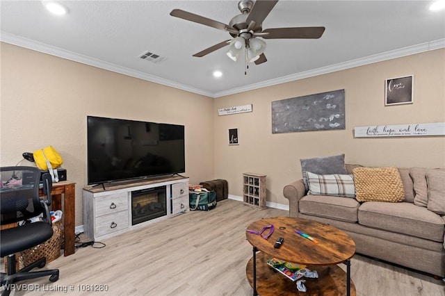 2128 N 53rd St, Fort Smith, AR 72904 - living area with wood finished floors, crown molding, a ceiling fan, recessed lighting, and baseboards
