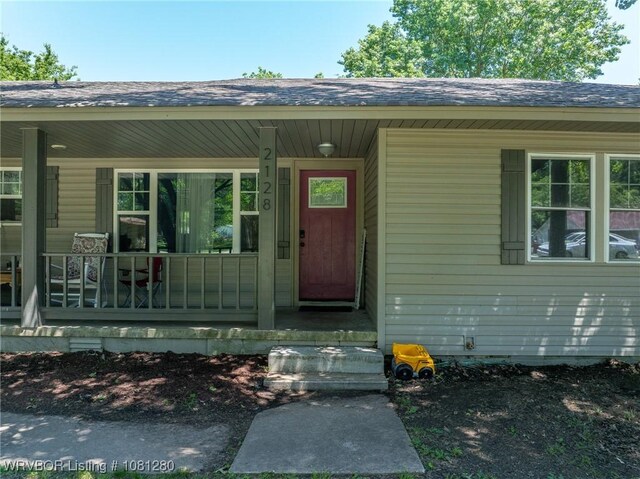 2128 N 53rd St, Fort Smith, AR 72904 - property entrance with a porch and roof with shingles