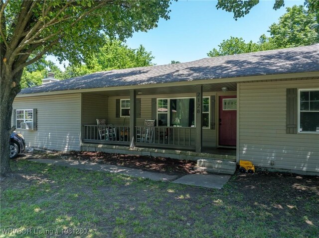 2128 N 53rd St, Fort Smith, AR 72904 - view of front of house featuring covered porch and a chimney