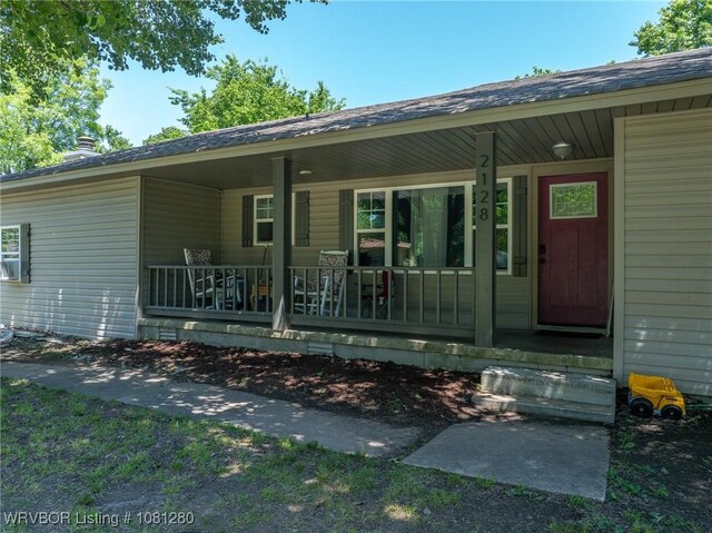 2128 N 53rd St, Fort Smith, AR 72904 - property entrance featuring a porch and a shingled roof