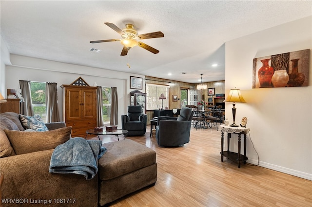 406 Hamilton St, Poteau, OK 74953 - living room with light wood-type flooring, ceiling fan, and recessed lighting