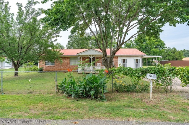 406 Hamilton St, Poteau, OK 74953 - single story home featuring a metal roof and brick siding