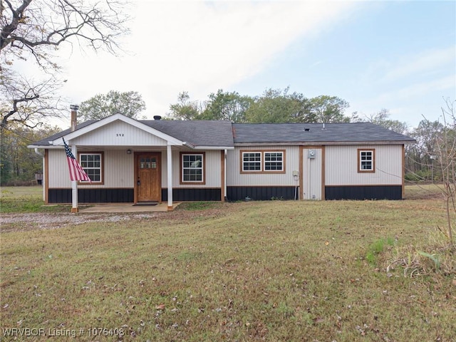 view of front of home with a front lawn and a porch