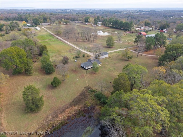 aerial view with a rural view and a water view