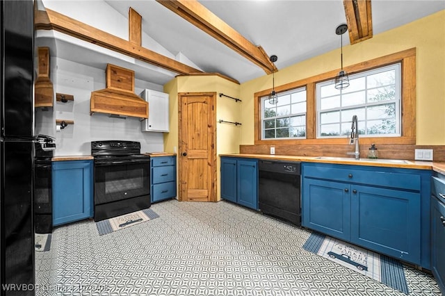 kitchen with custom range hood, decorative light fixtures, blue cabinets, and black appliances