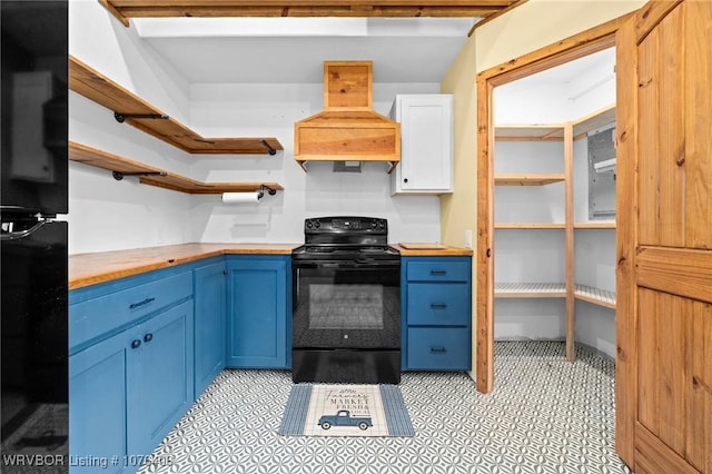 kitchen featuring white cabinets, electric range, premium range hood, and blue cabinets